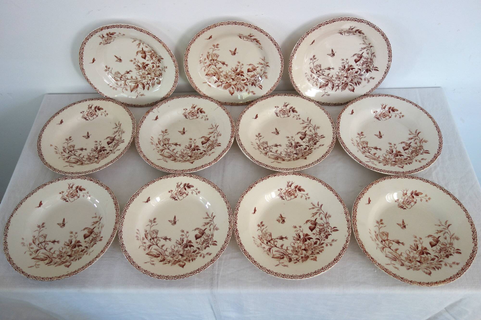 11 deep plates Terre De Fer Gien model Mai circa 1900