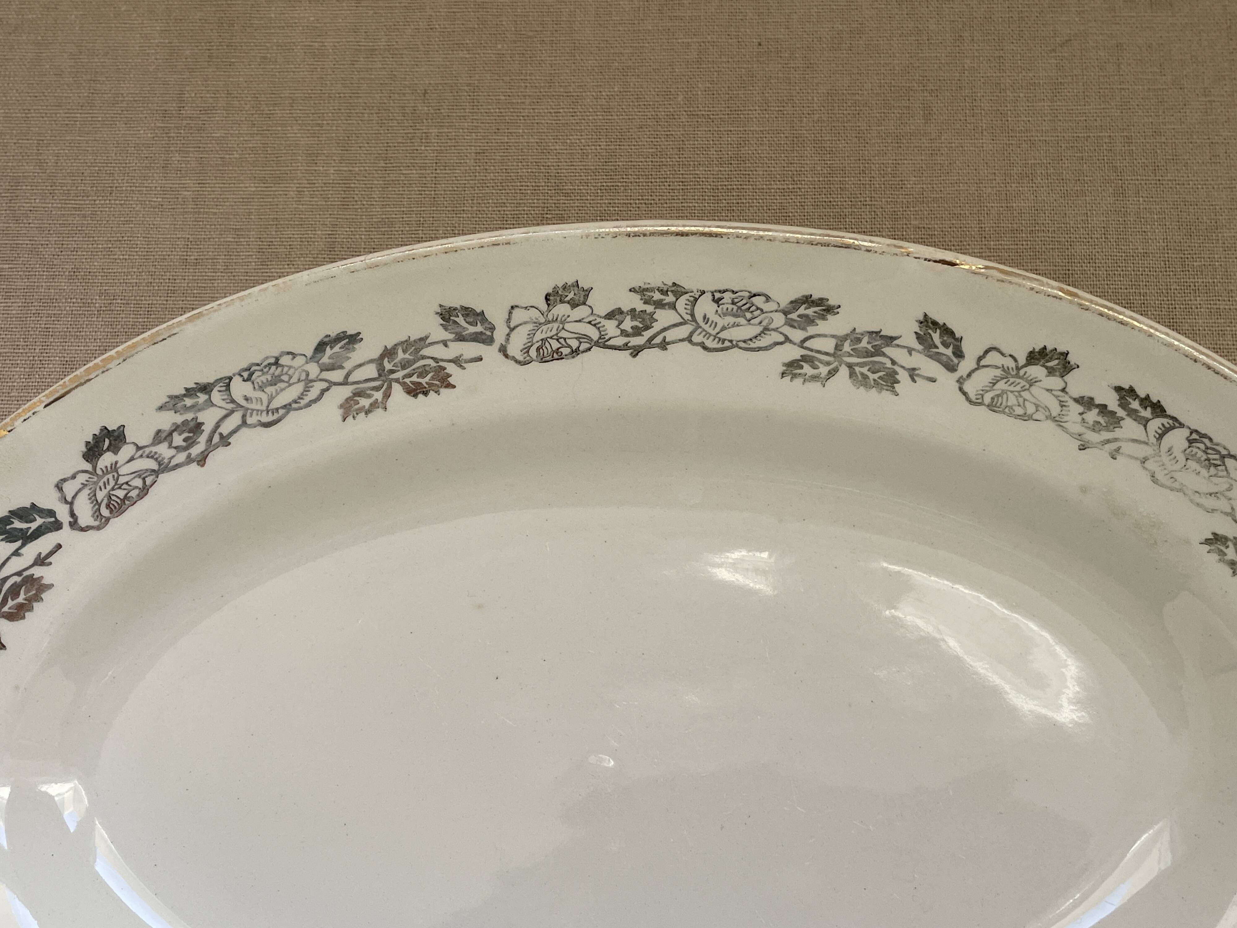 Antique oval plate Moulin des Loups Orchies – grey and gold floral decoration