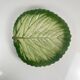 Leaf and strawberry-shaped bowl/strainer.