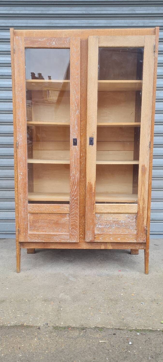 Armoire pied compas en chêne blond
