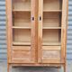 Armoire pied compas en chêne blond