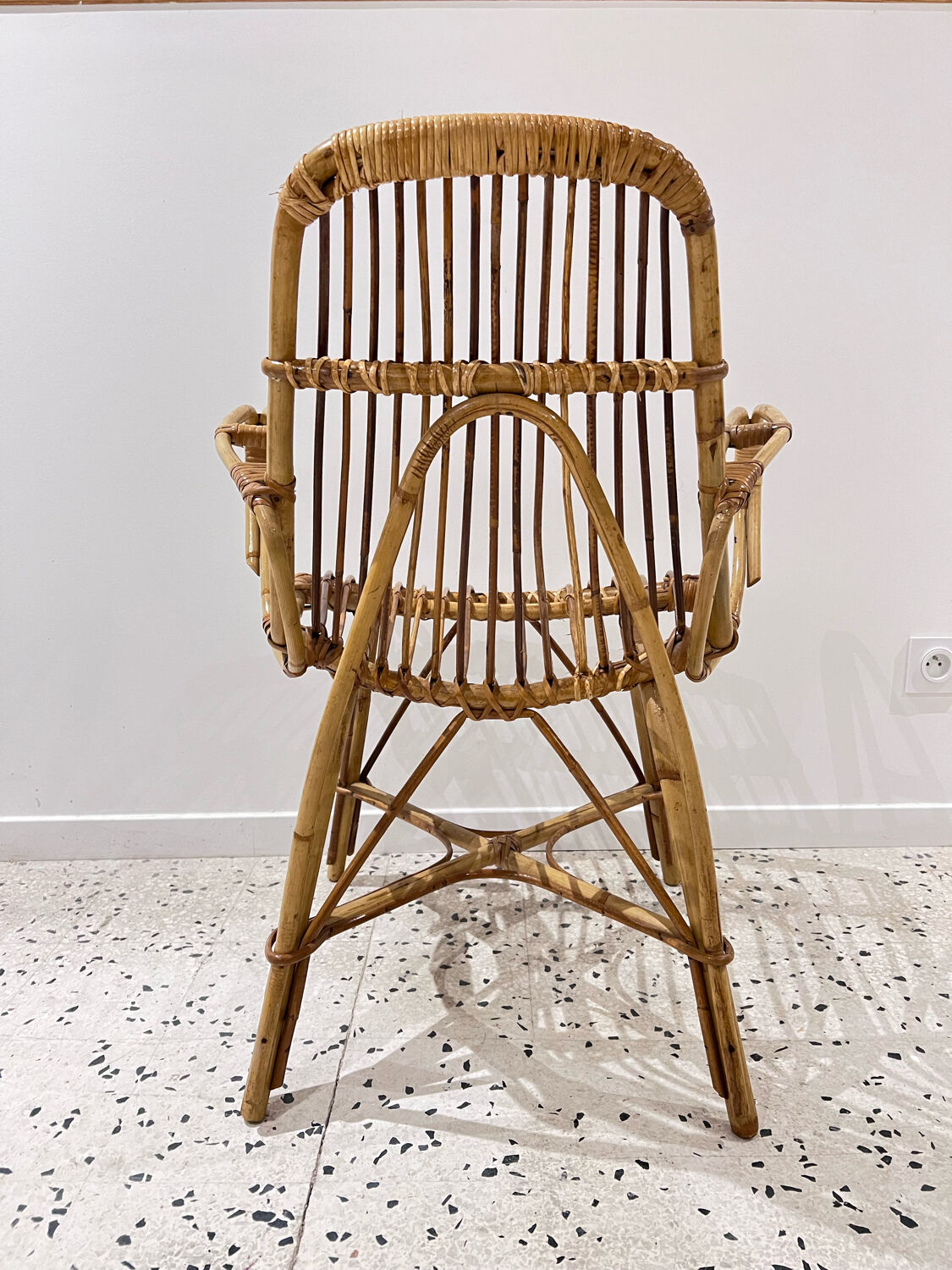 Six vintage rattan chairs