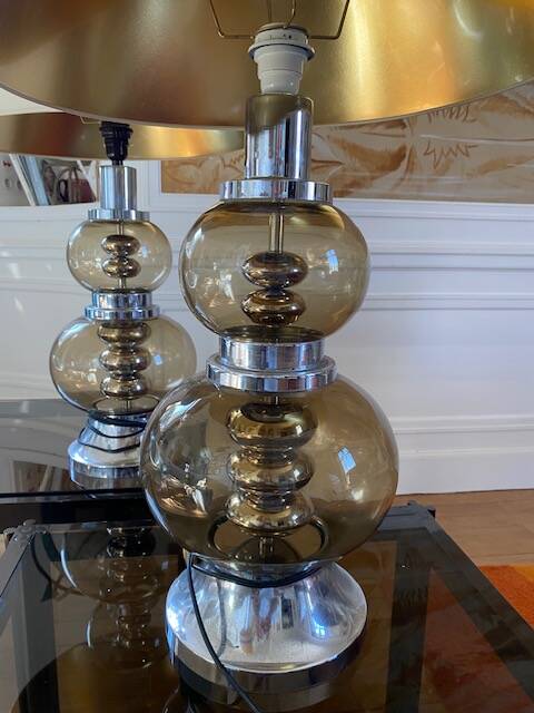 pair of smoked glass and chrome lamps