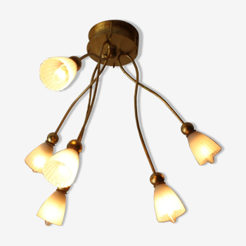 Organic golden metal ceiling light with 6 flowers.
