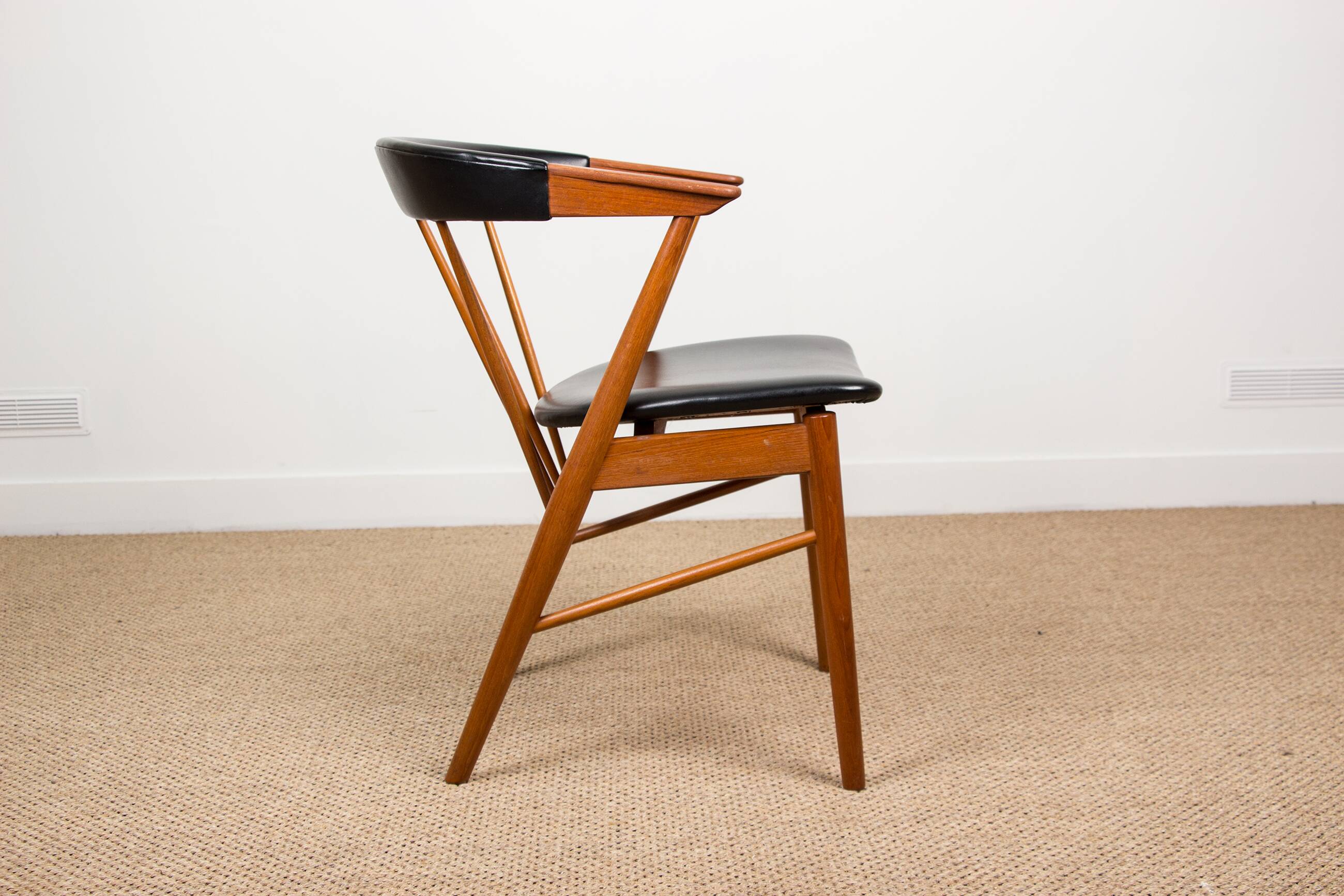 Danish armchair in teak and skai by Helge Sibast for Sibast 1955.