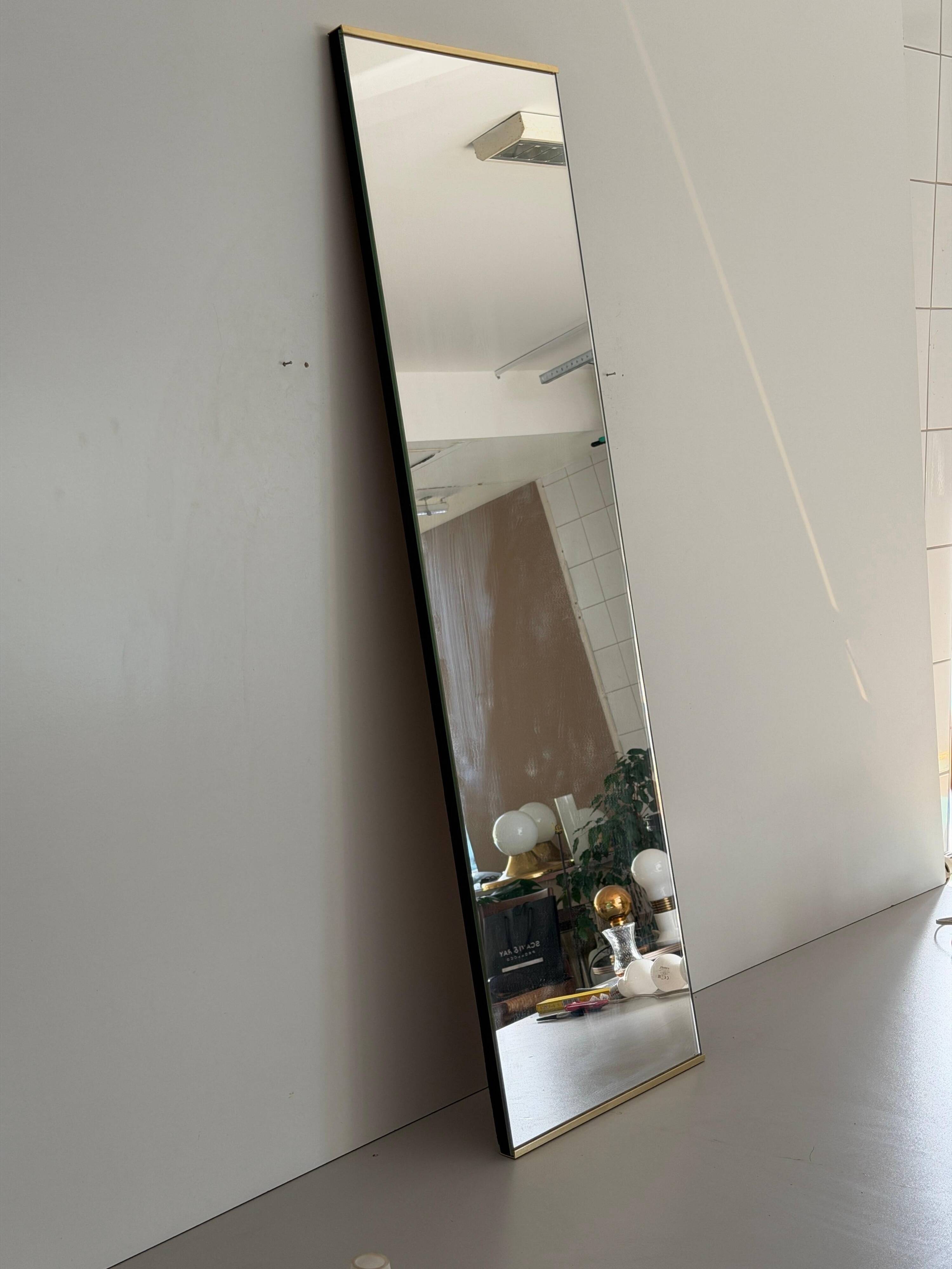 Minimalist rectangular wall mirror with a brass frame, 1960s, Germany
