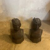 Pair of cast iron andirons with face