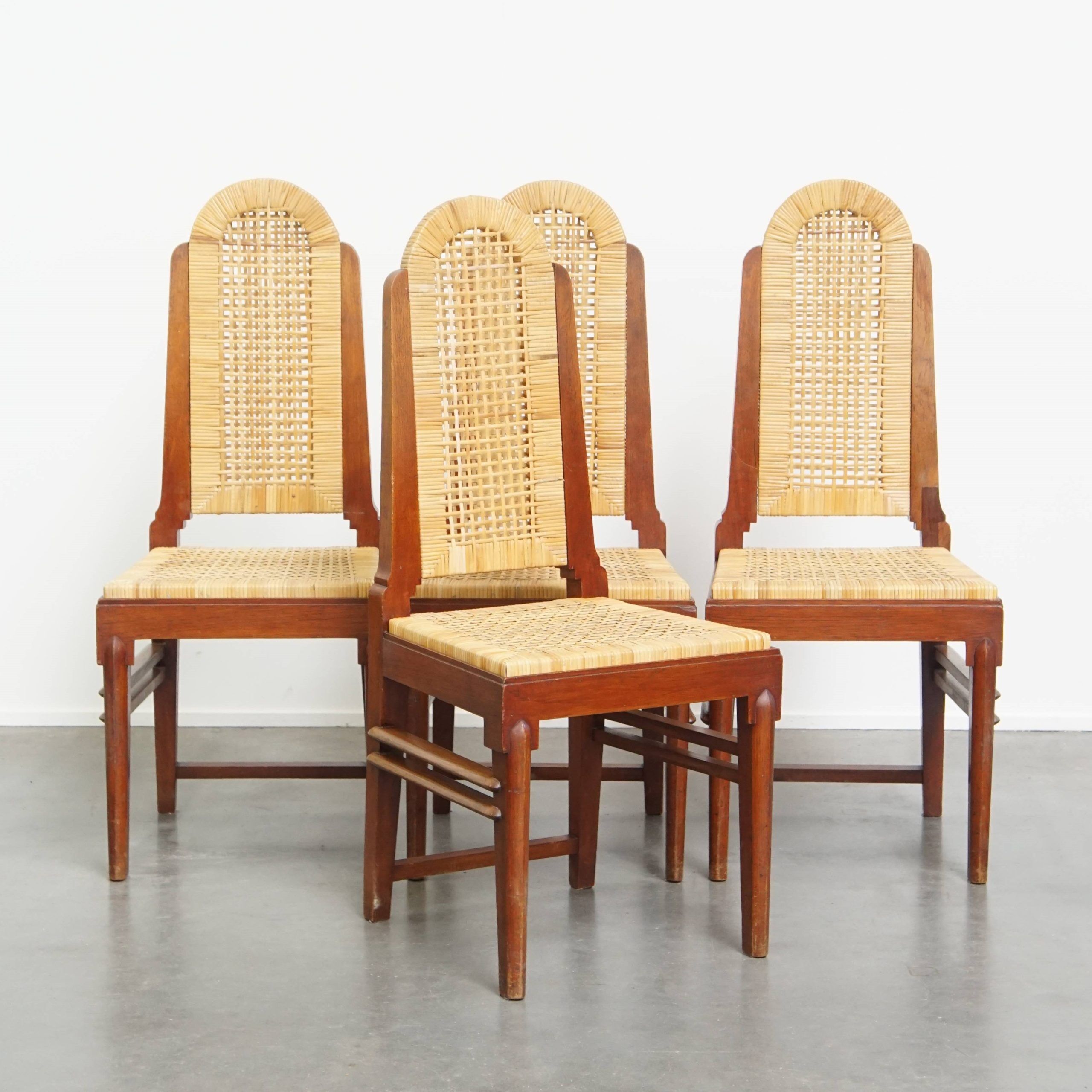 Set of four rattan Art Deco design dining chairs with high back