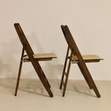 Pair of vintage folding chairs year 50 sculpted backrest.