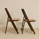 Pair of vintage folding chairs year 50 sculpted backrest.