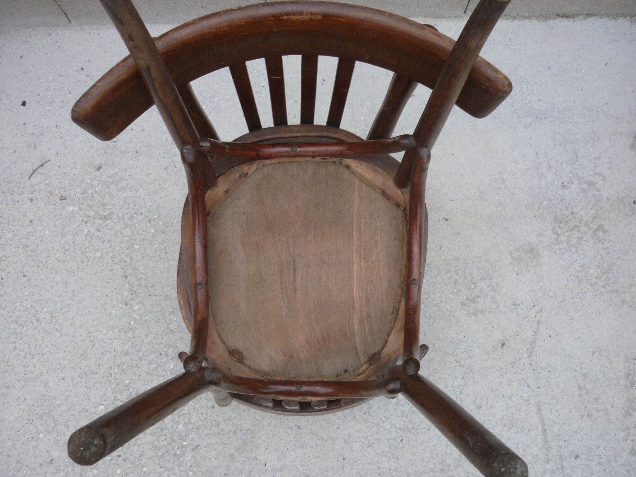 Pair of old bistro chairs with dark patina