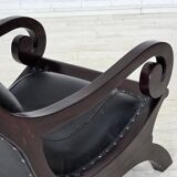 1970s, vintage armchair with footstool, black furniture leather.