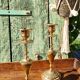 Pair of chiseled brass candle holders