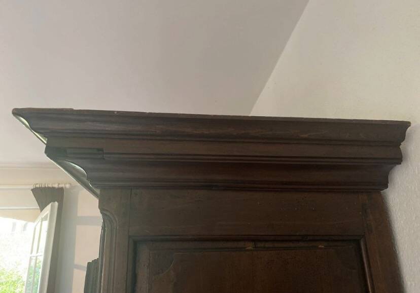 “Large regional 18th-century walnut inlaid wardrobe”