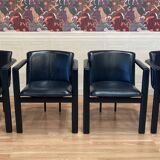 Set of 4 designer leather and metal armchairs.