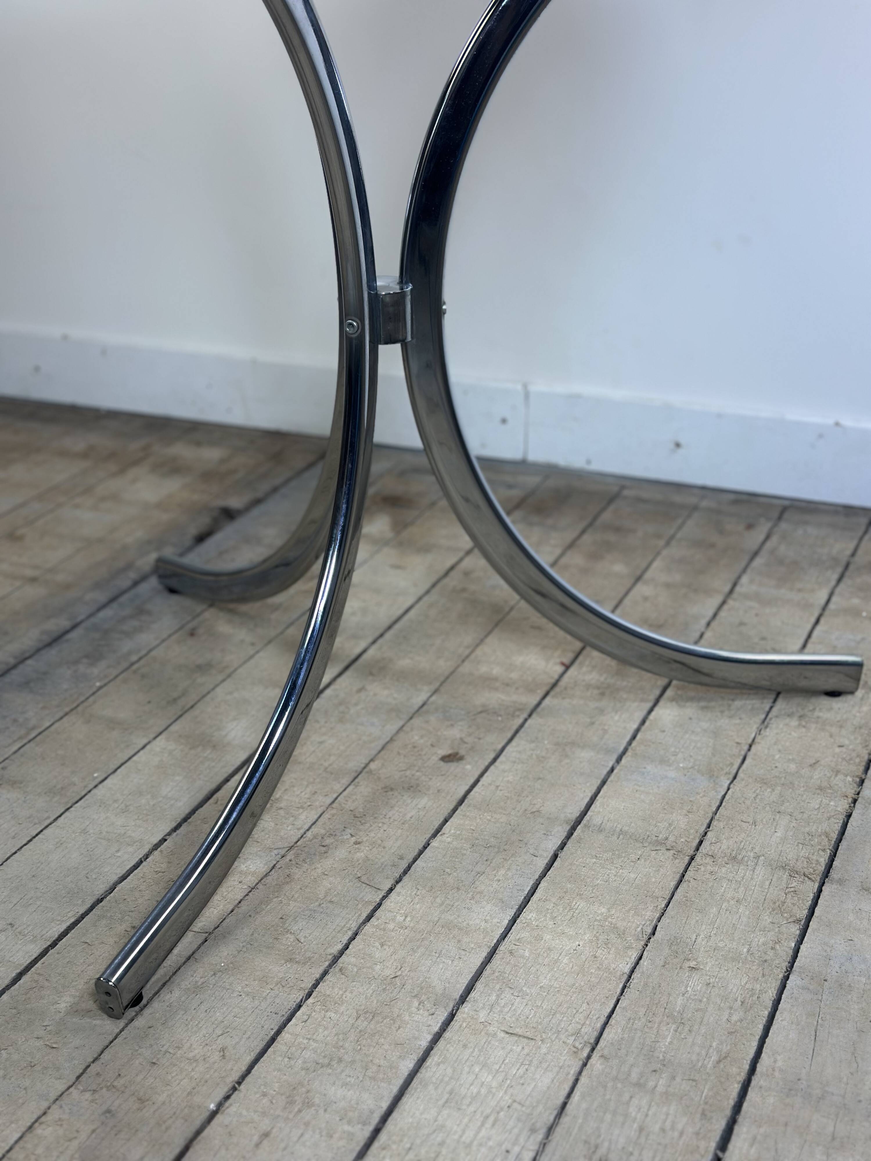 Vintage 1970s round metal and smoked glass table