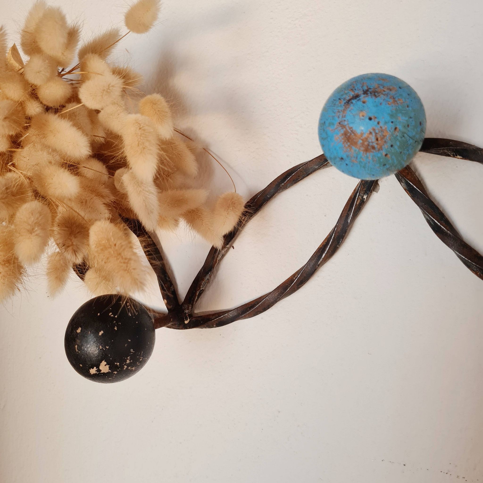 Vintage wall-mounted coat rack in wrought iron with coloured balls - Roger Feraud