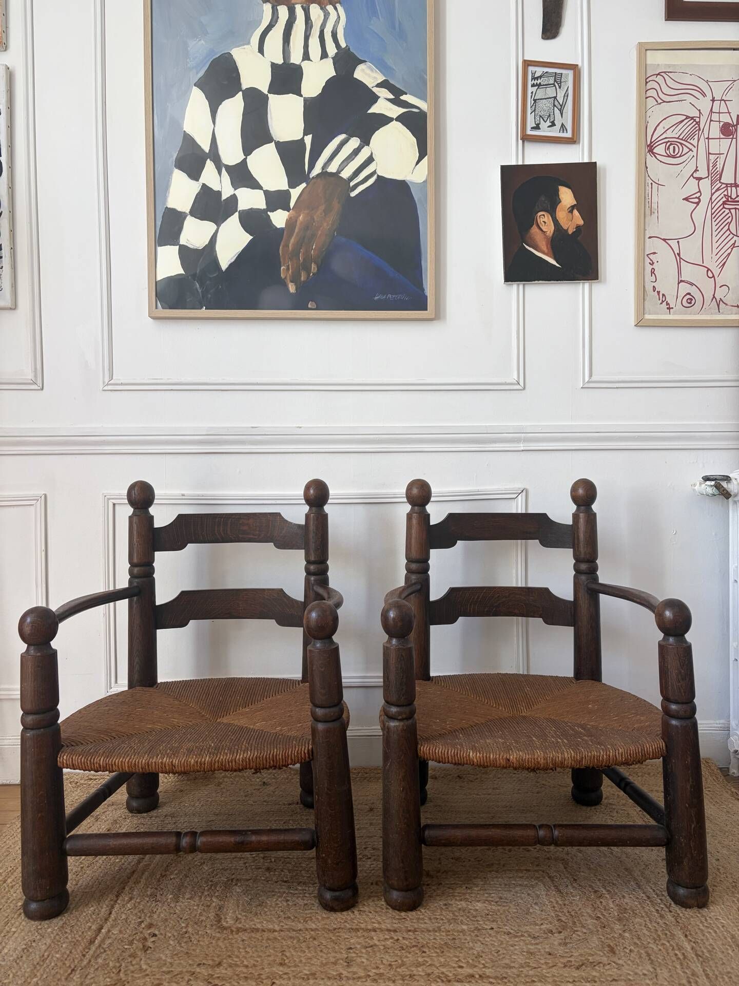 Paire de fauteuils en bois et paille  Charles Dudouyt 