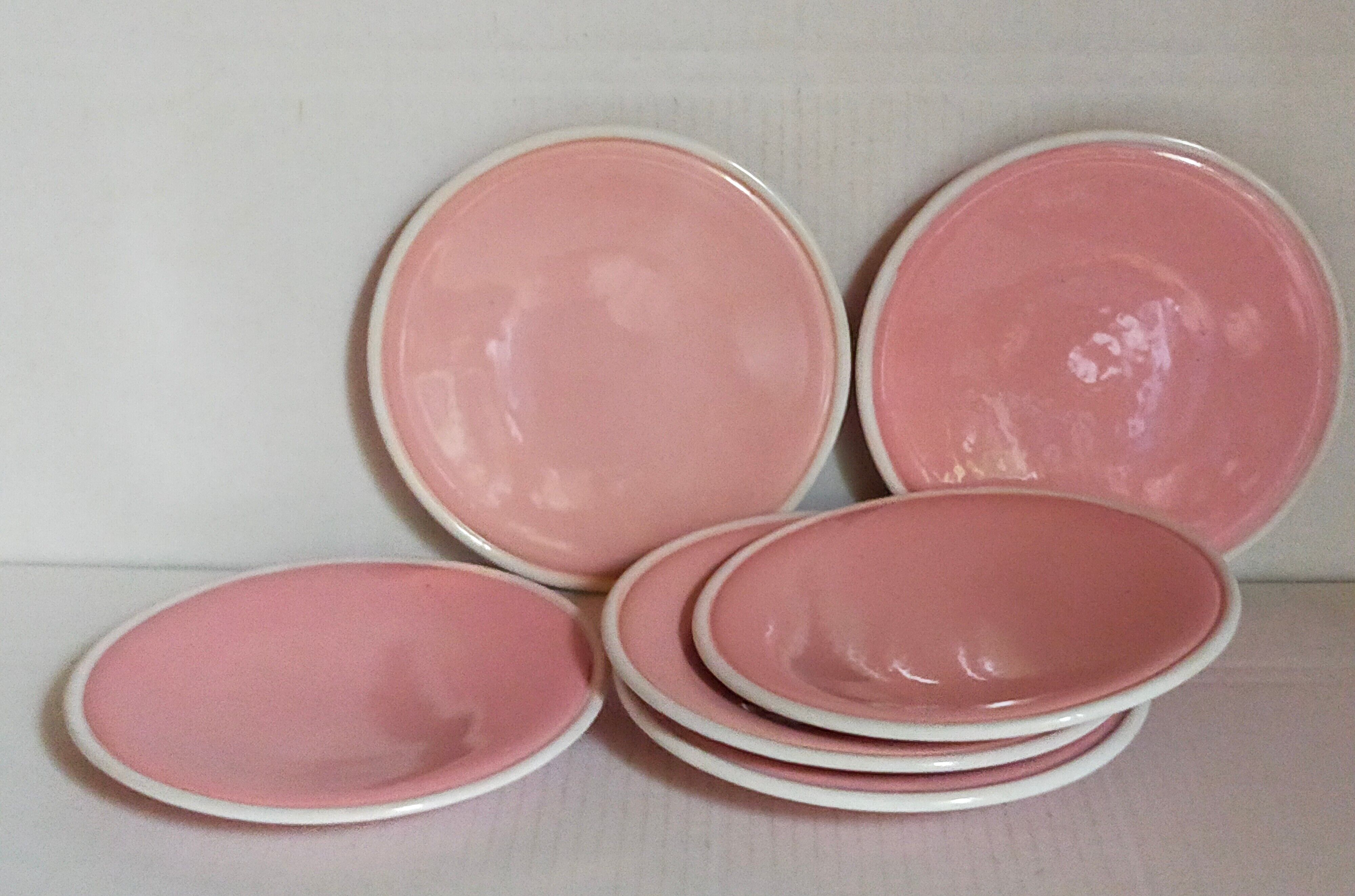 Six old pink earthenware dessert plates