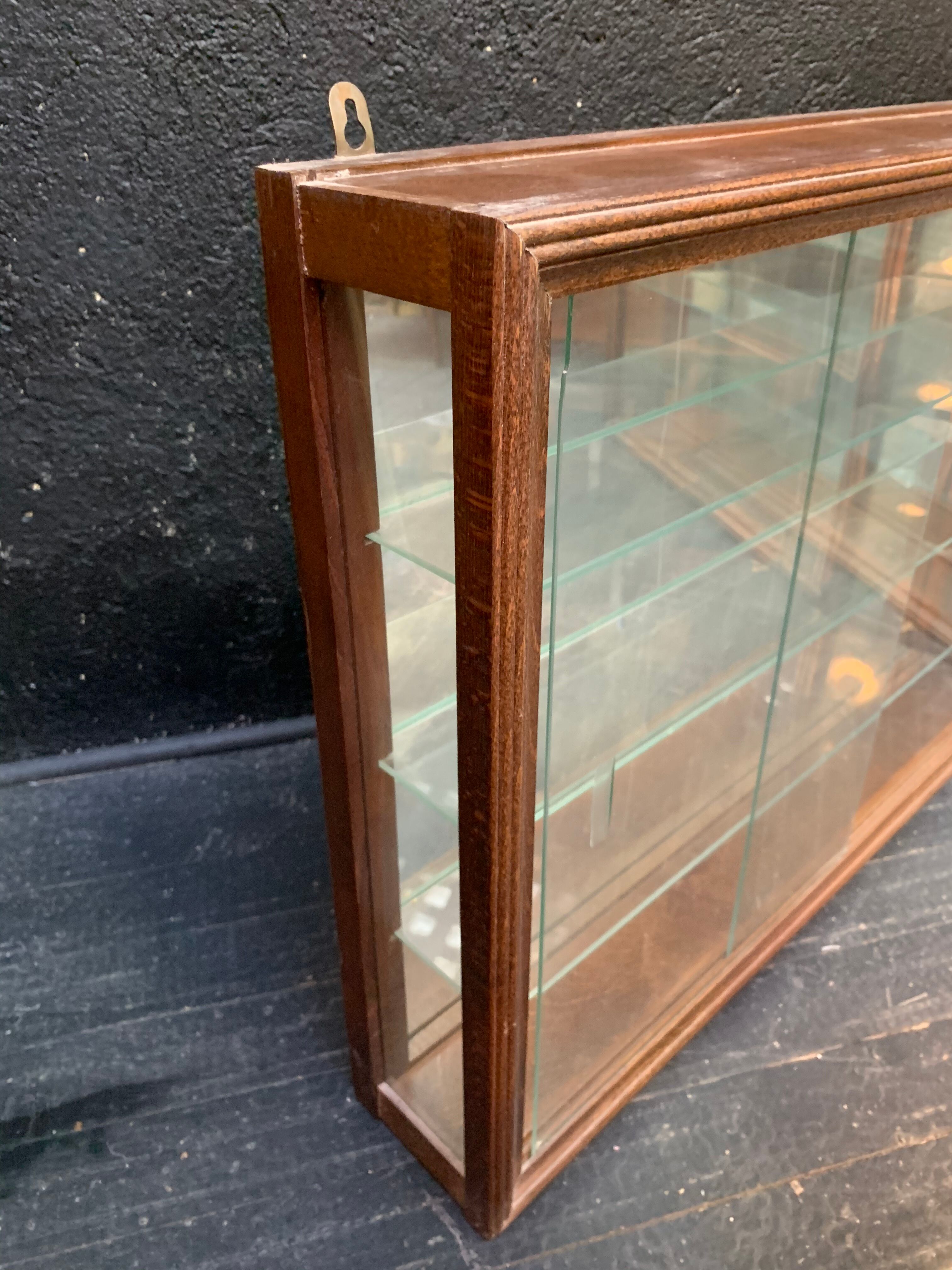 Pair of wooden showcases
