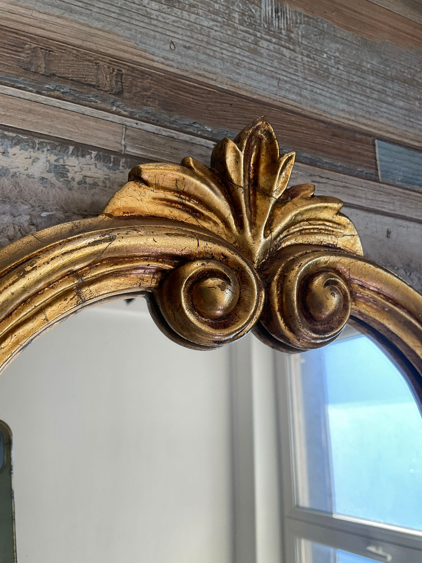 Vintage gold baroque mirror from the 1970s.