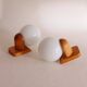 Pair of wall lights in pine and opaline, 1960s.