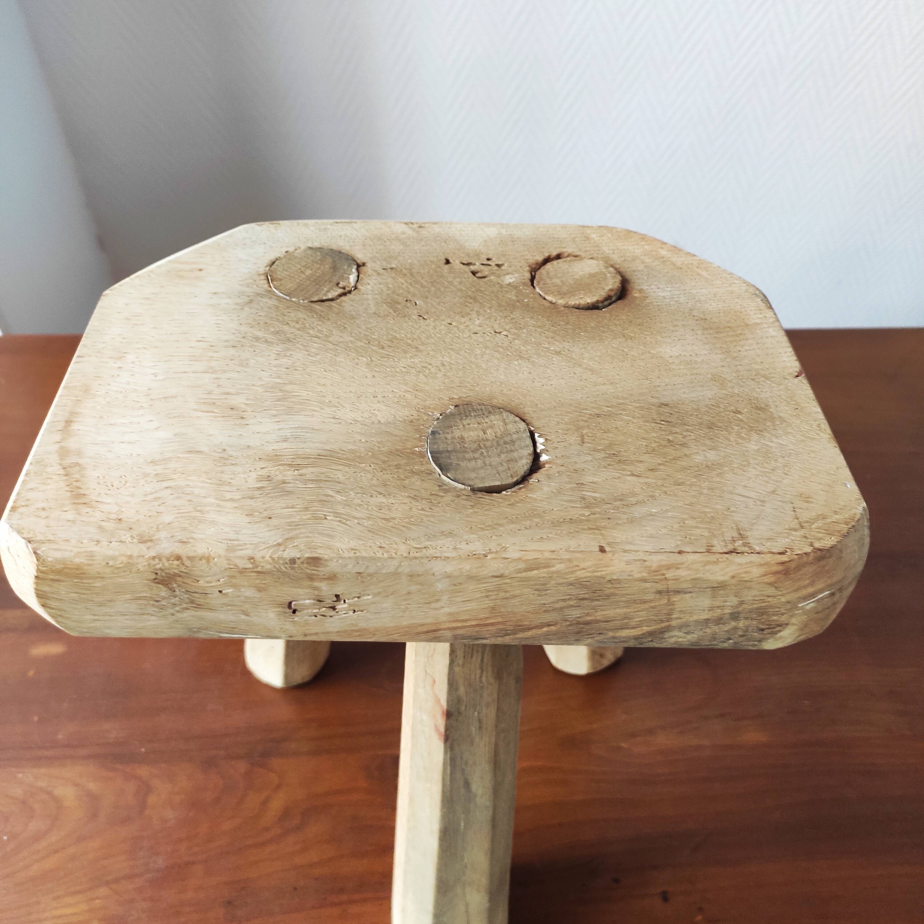 Vintage Danish brutalist tripod stool made of solid oak.