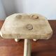 Vintage Danish brutalist tripod stool made of solid oak.