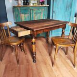 Antique farmhouse table and bistro chairs