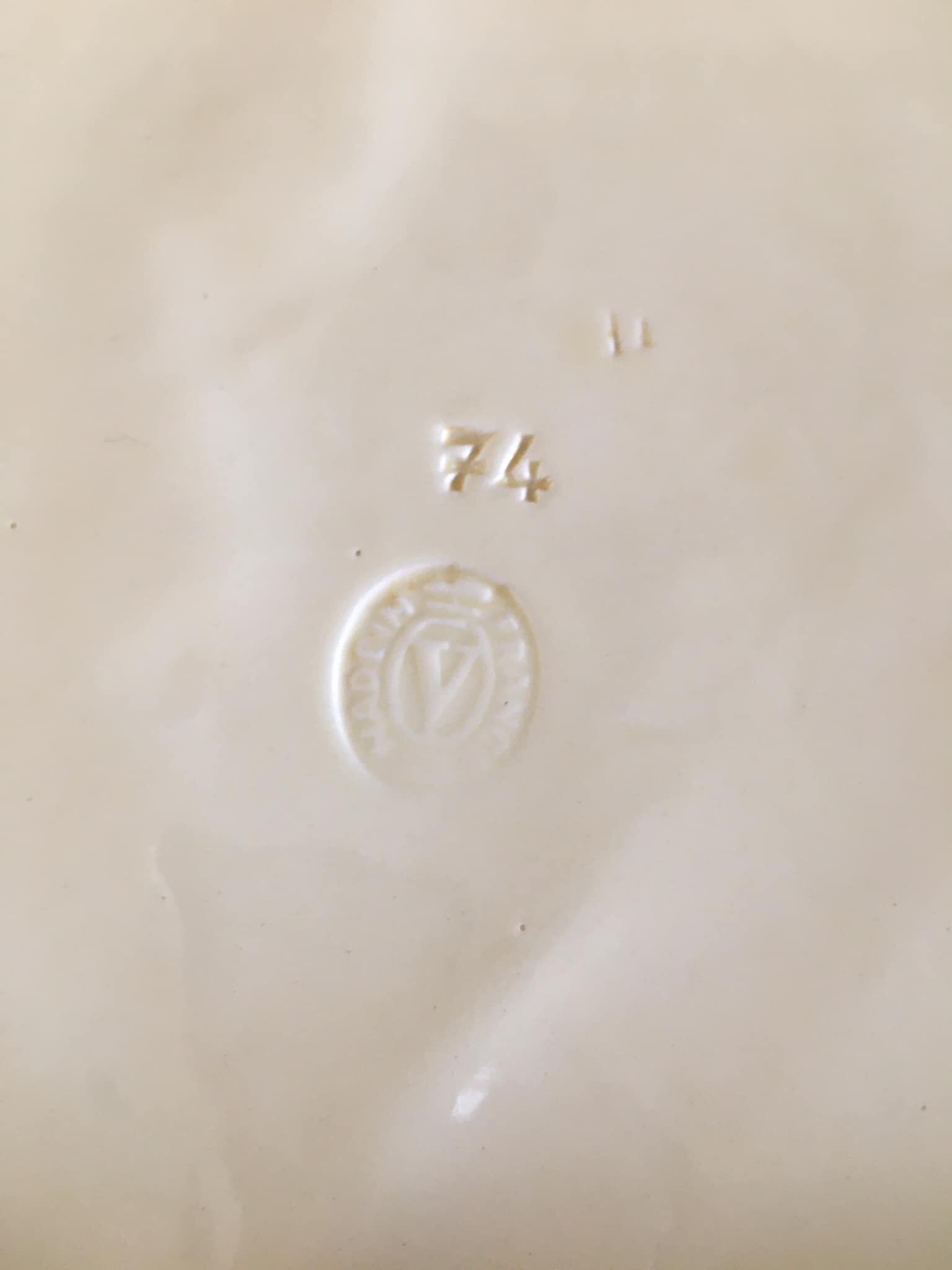 Antique rectangular ceramic trivia with inlaid leaves