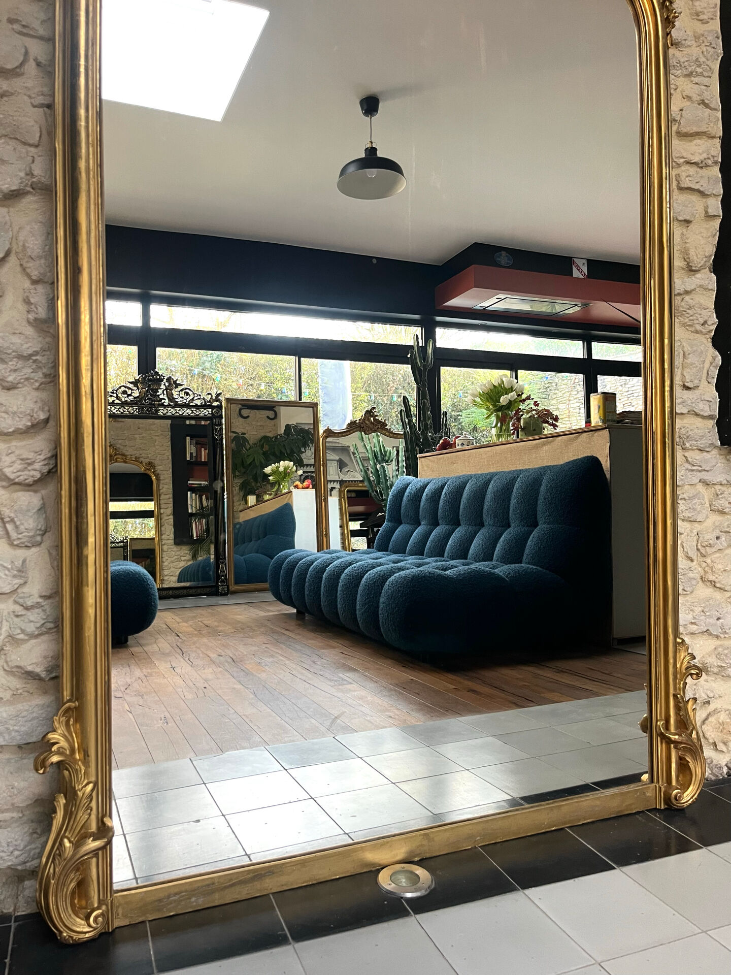 Gold leaf mirror with pediments, 219/131cm, overmantel.