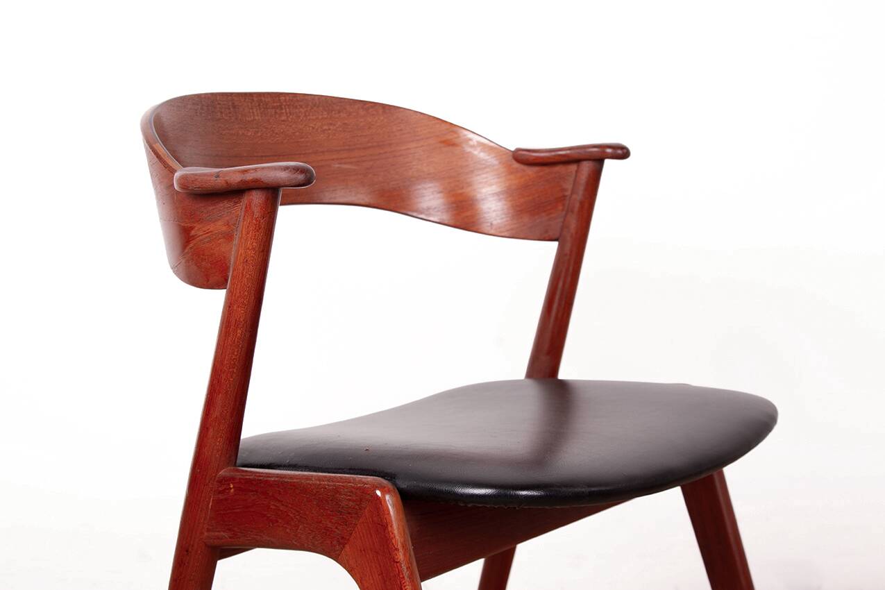 Danish armchair in teak and Skai, by Henning Kjaernulf for Korup Stolefabr.