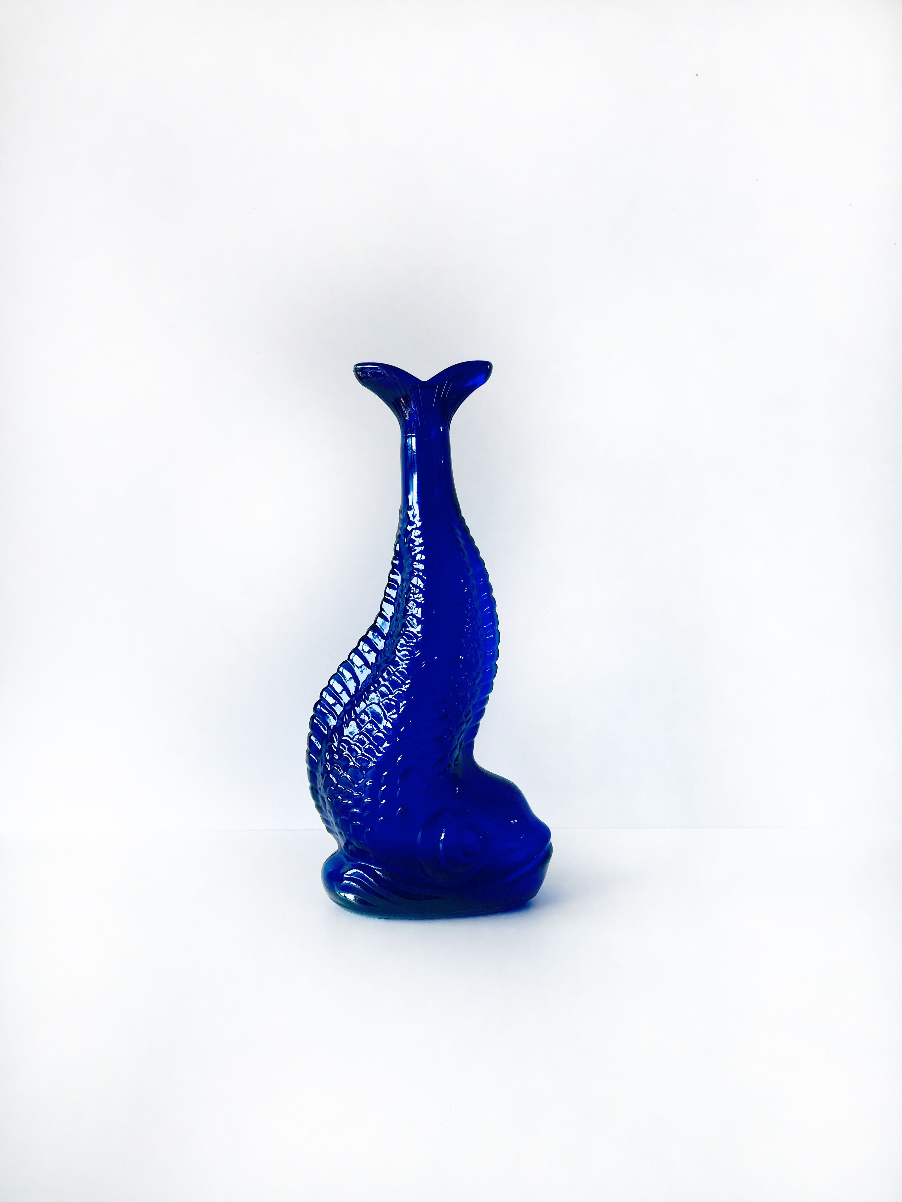 Blue glass fish vase