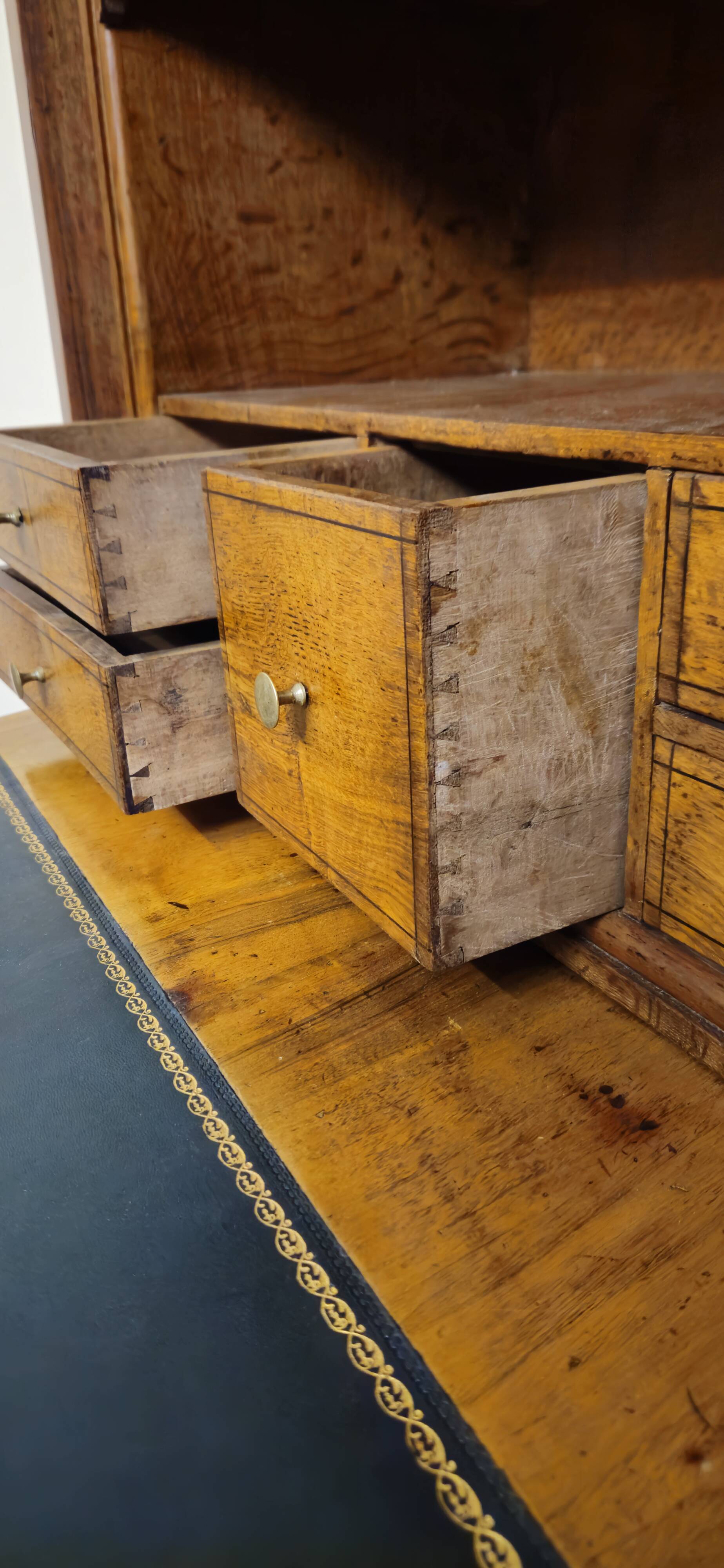 Secretary with a curved drop-leaf in floral marquetry, mid-19th century.