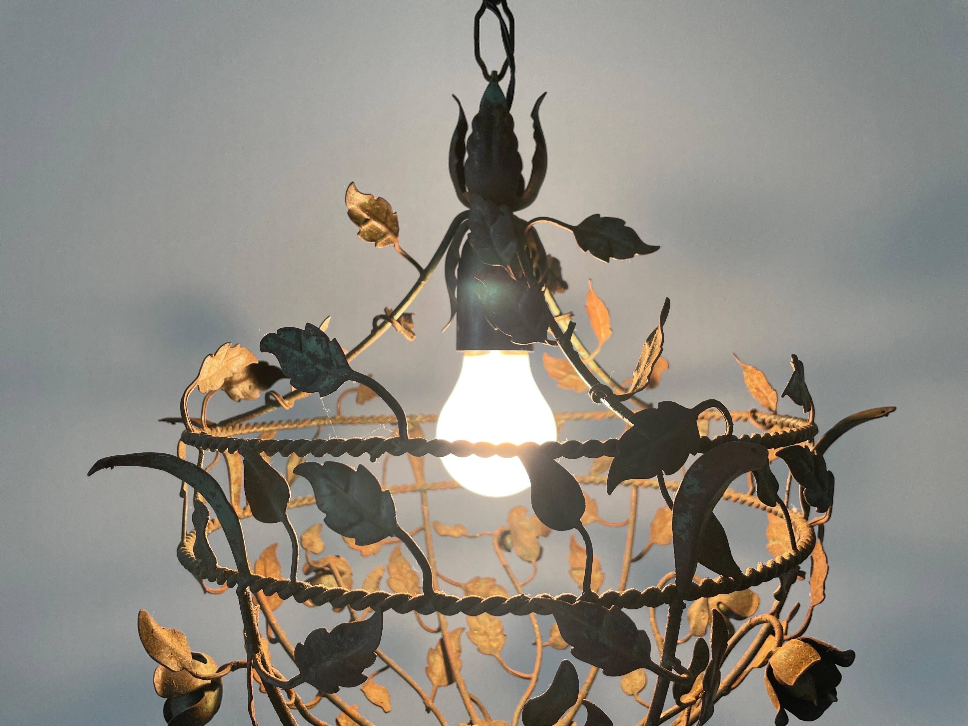 Patinated metal ceiling light with a floral and leaf pattern, 1950s, Italy.