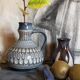 Ceramic handle vase with vintage graphic decoration