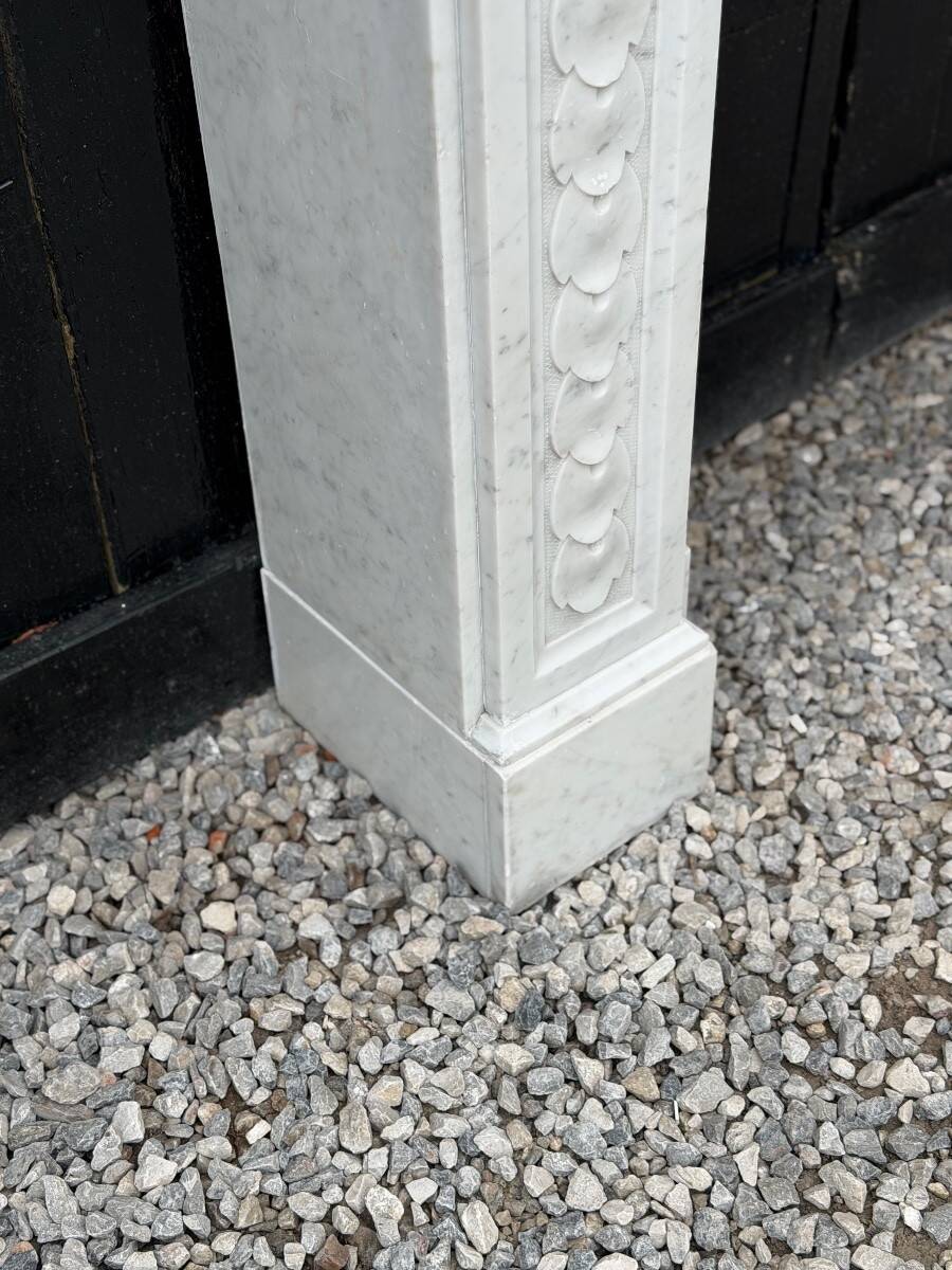Louis XVI style fireplace in Carrara marble, circa 1880.