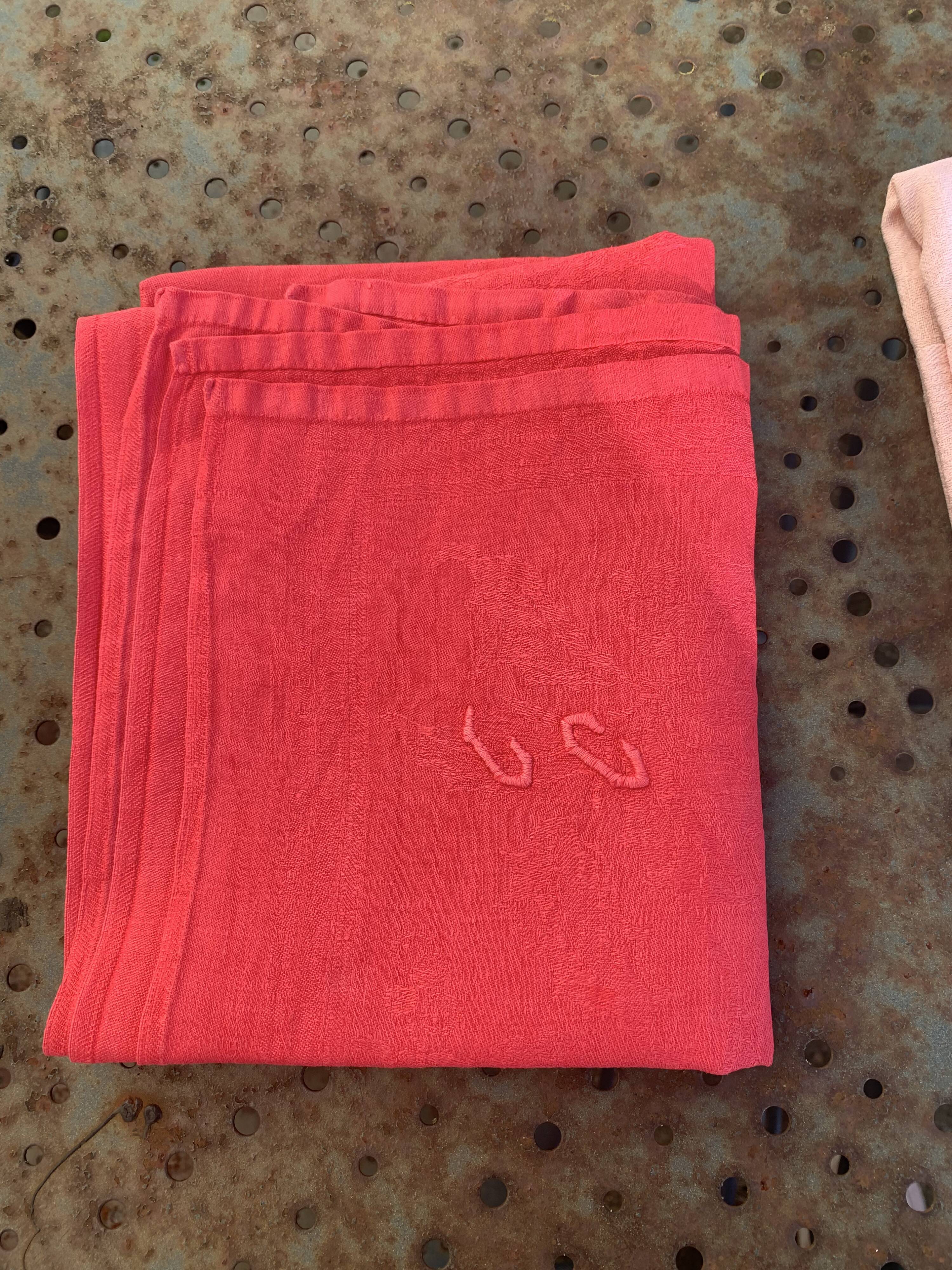 Duo set, consisting of two large pink-dyed cotton and linen towels, embroidered, TK monograms