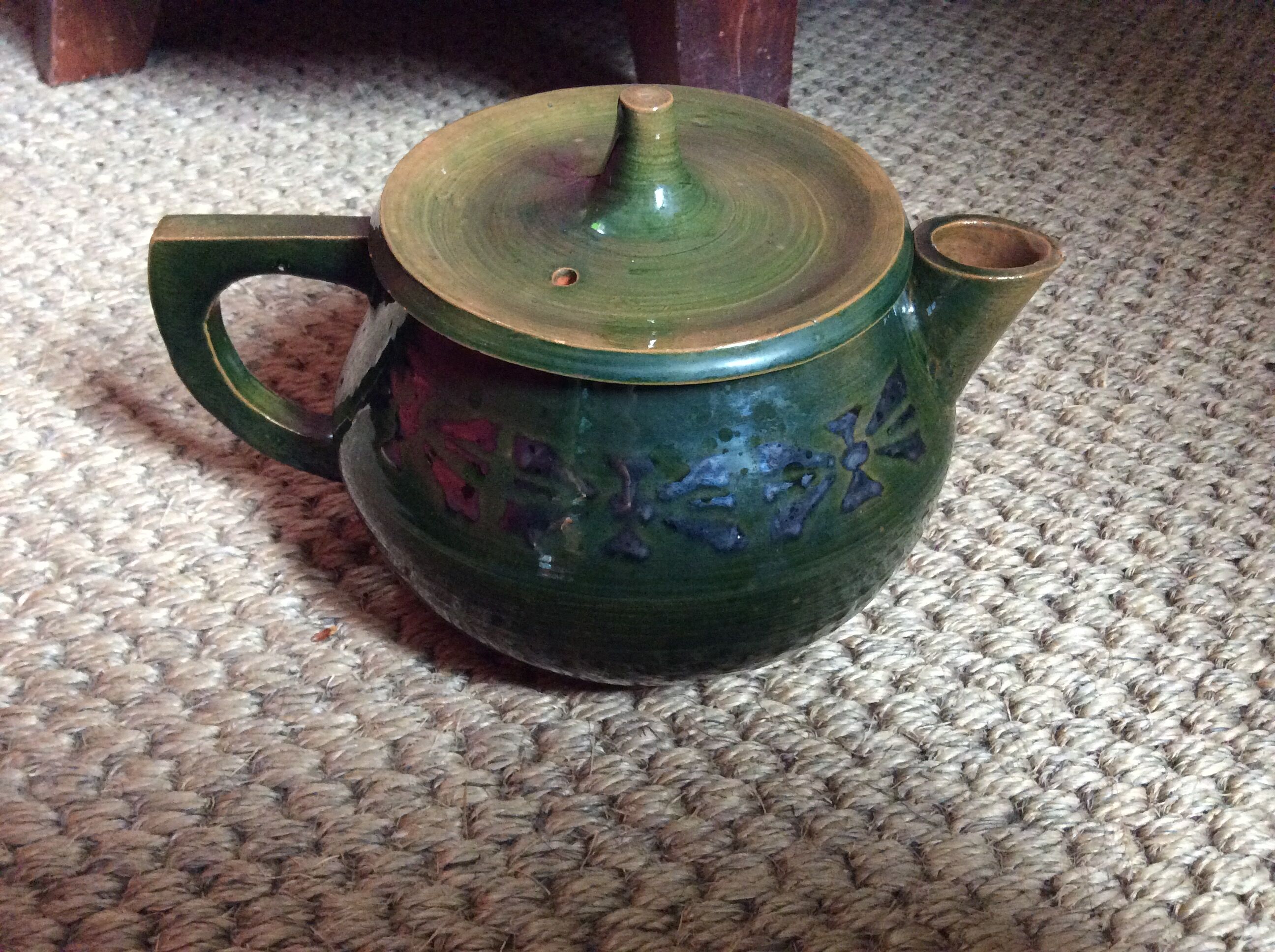 Glazed terracotta teapot