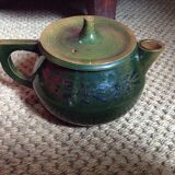 Glazed terracotta teapot