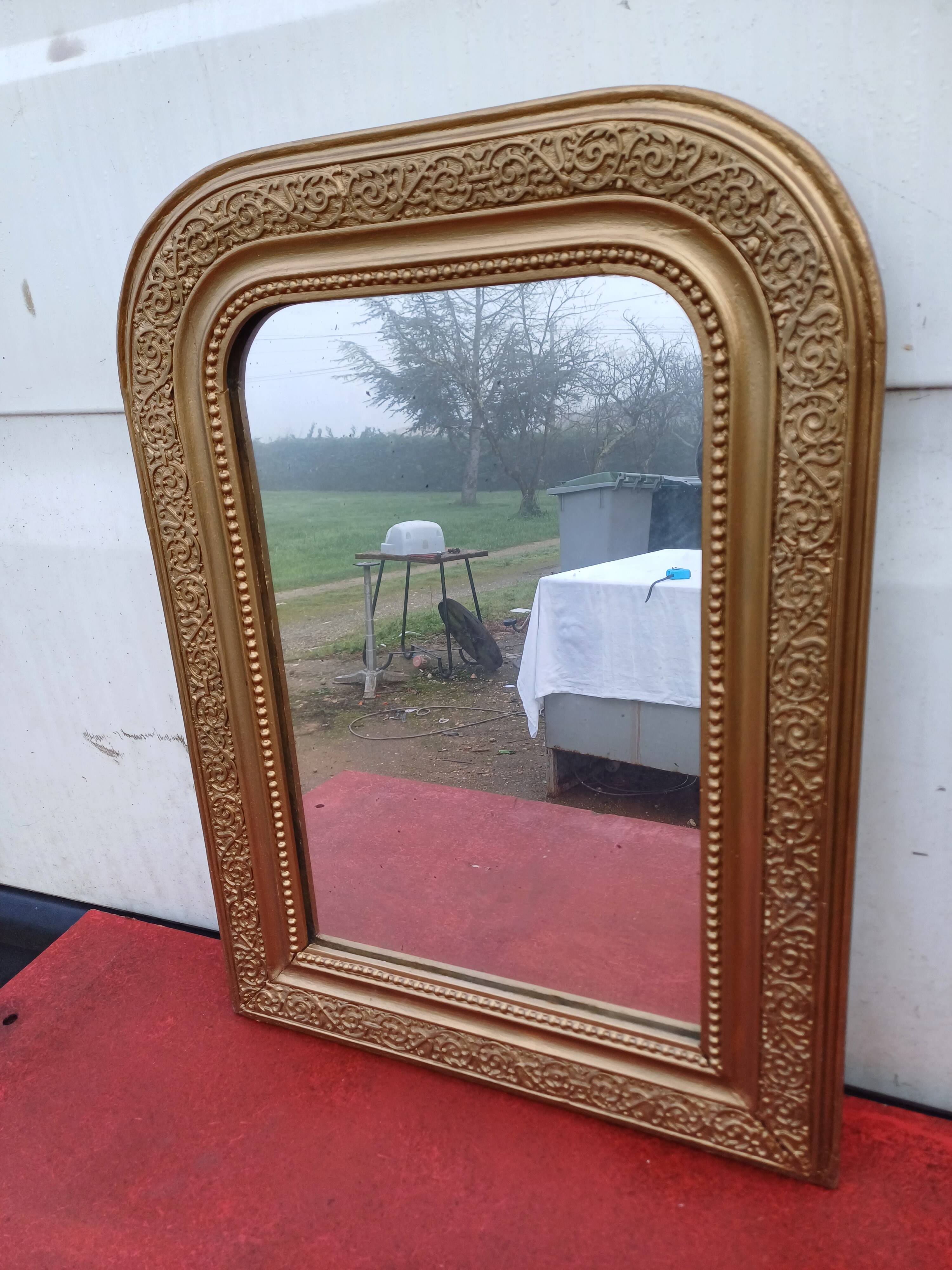 19th century wood and gilded stucco mirror