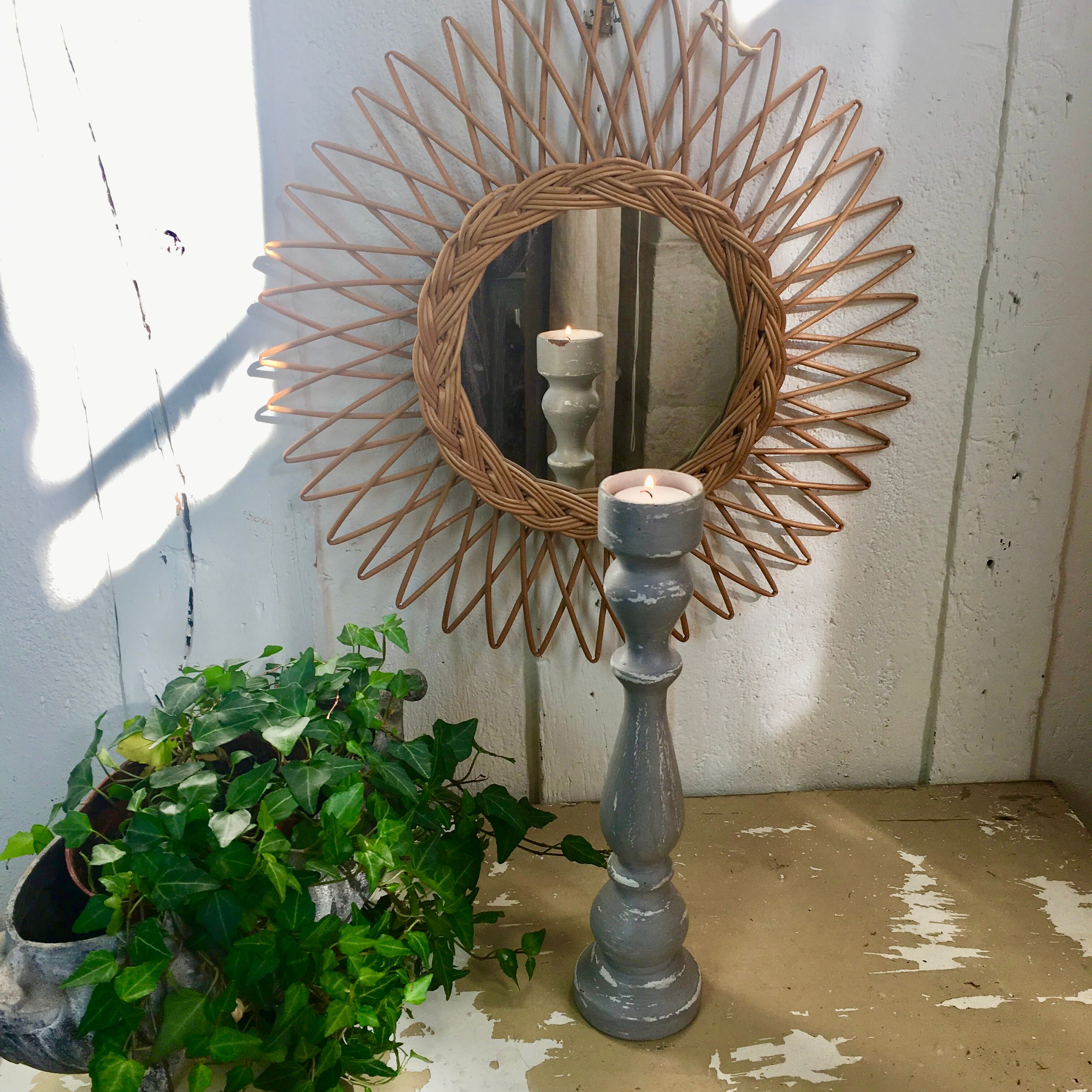 Old gray wood candlestick