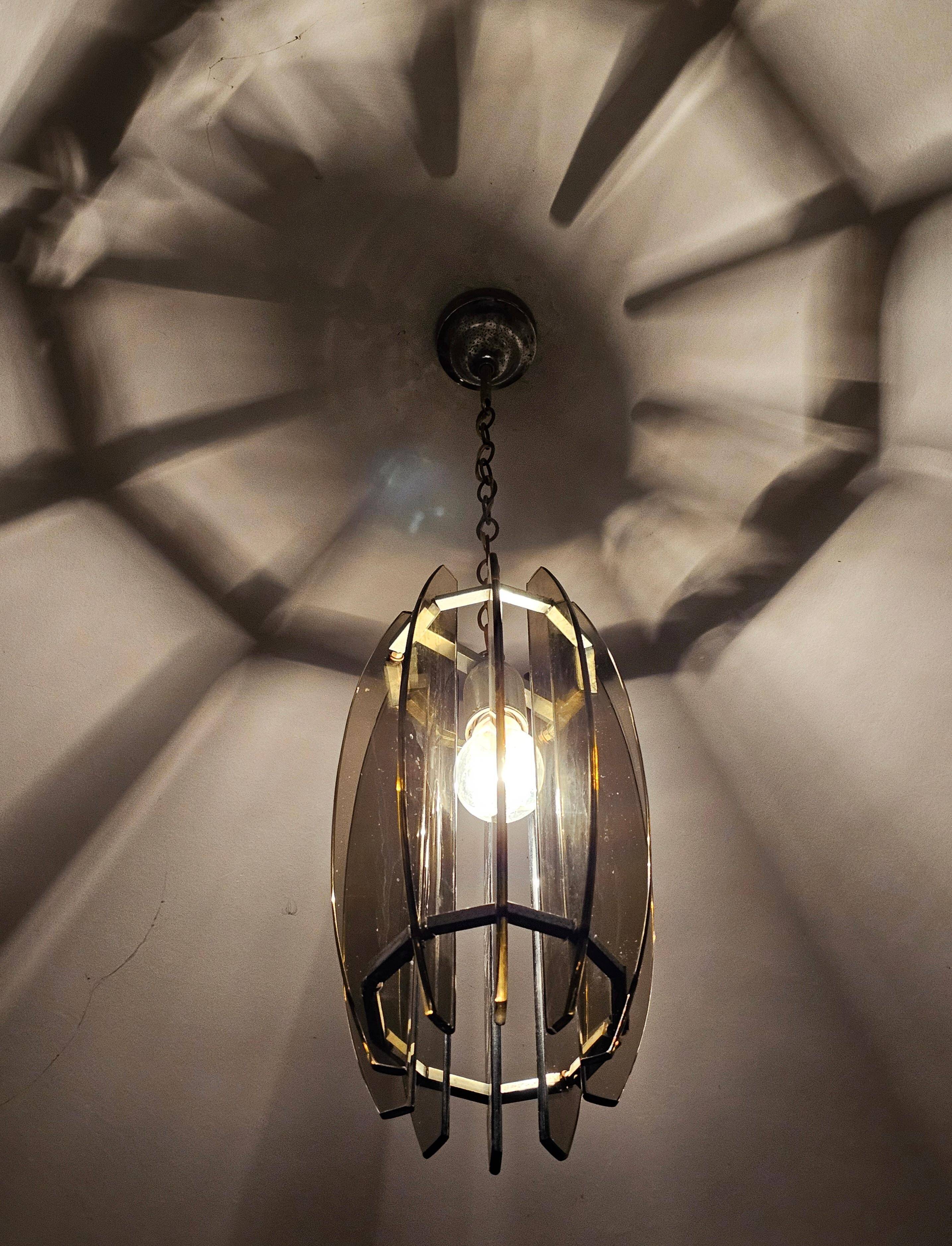 Glass chandelier, chrome and smoked glass in the Fontana Arte style from the 1970s.