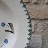 Old deep iron earth plate with blue flower pattern