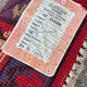 Handwoven wool oriental rug – 220 × 100 cm