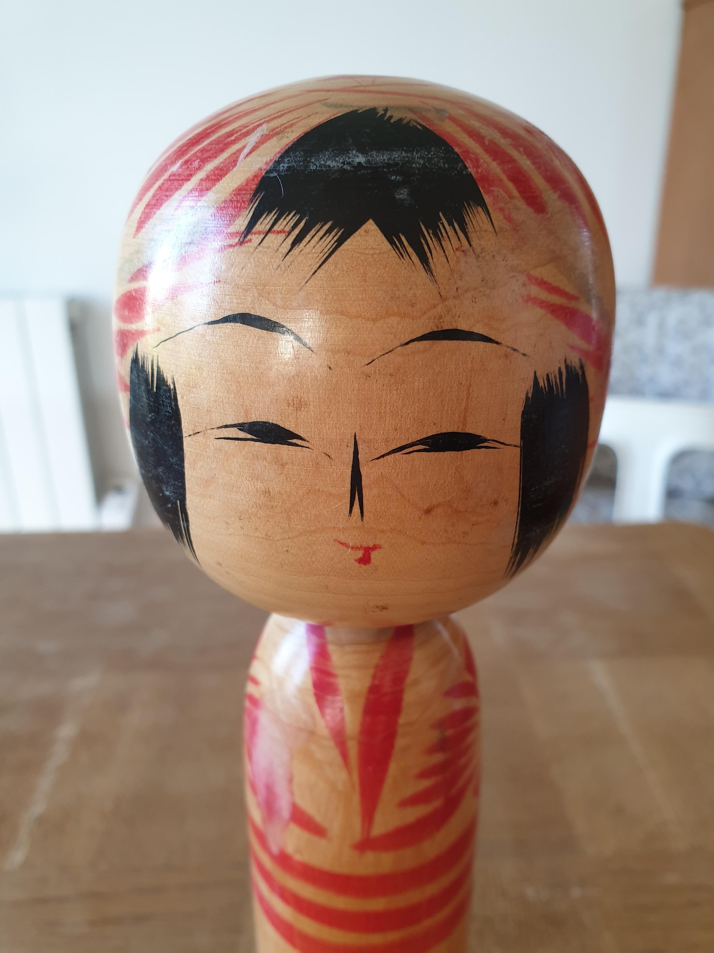 Japanese hand-painted Kokeshi doll from the 1960s