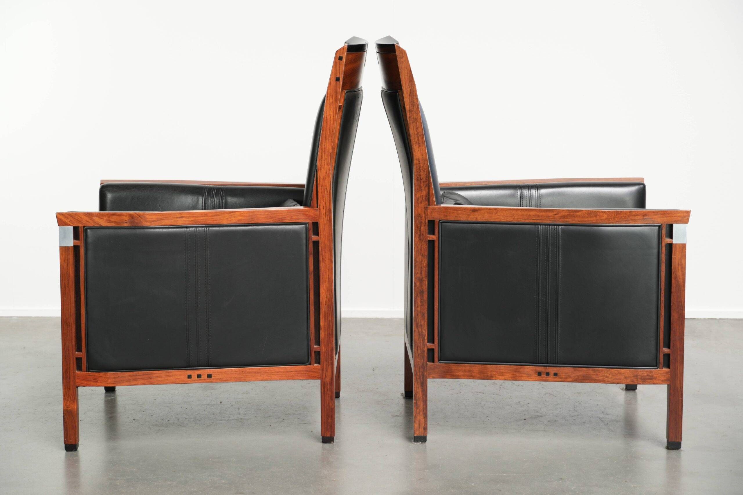 Set of 2 Art Deco design armchairs in black cowhide leather