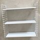 Tomado wall shelves designed by d. dekker for tomado
