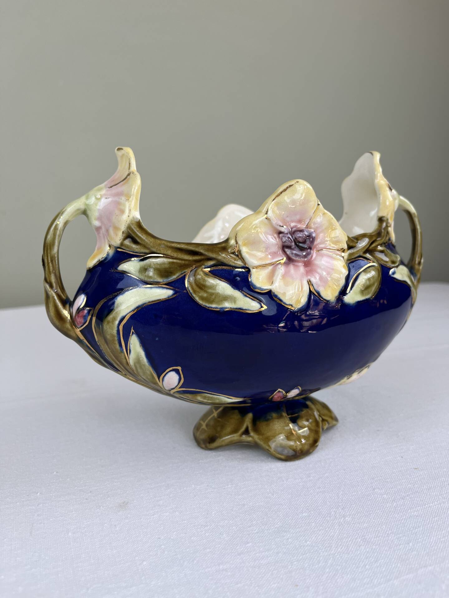 Art Nouveau navy blue barbotine bowl with raised floral decoration