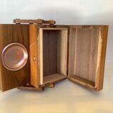 Old wooden cigarette box and ashtray